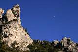  The moon in a clear blue sky above Les Orgues on Mont Liausson